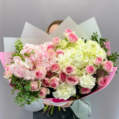 Bouquet of pink, white hydrangeas and bush roses
