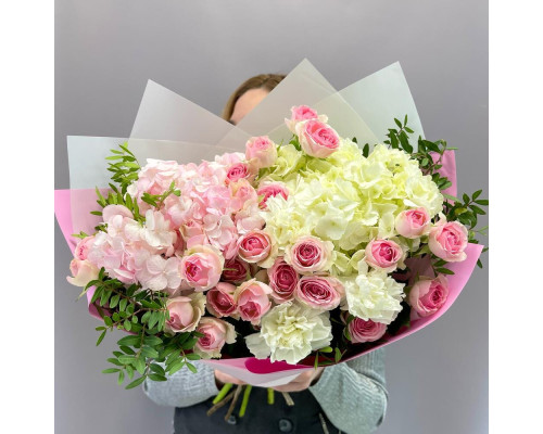 Bouquet of pink, white hydrangeas and bush roses