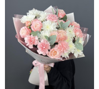 Delicate bouquet of bush roses and chrysanthemums