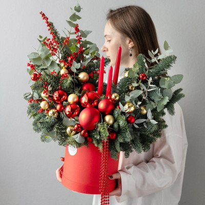 Winter New Year's composition made of spruce with decor