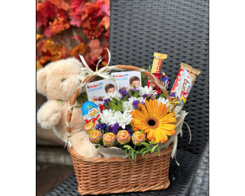 Children's basket with a teddy bear Children's basket with a teddy bear